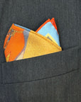 Colorful pocket square folded in a suit pocket